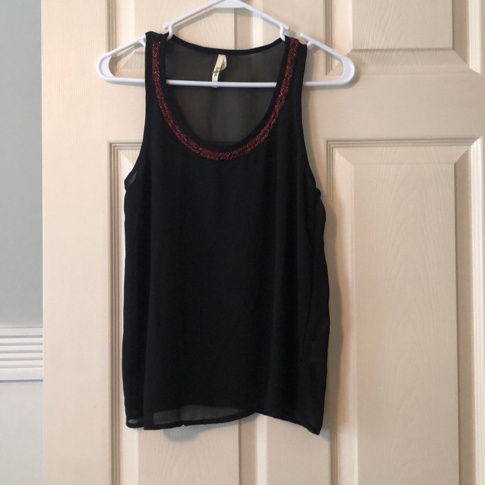 Black sleeveless blouse